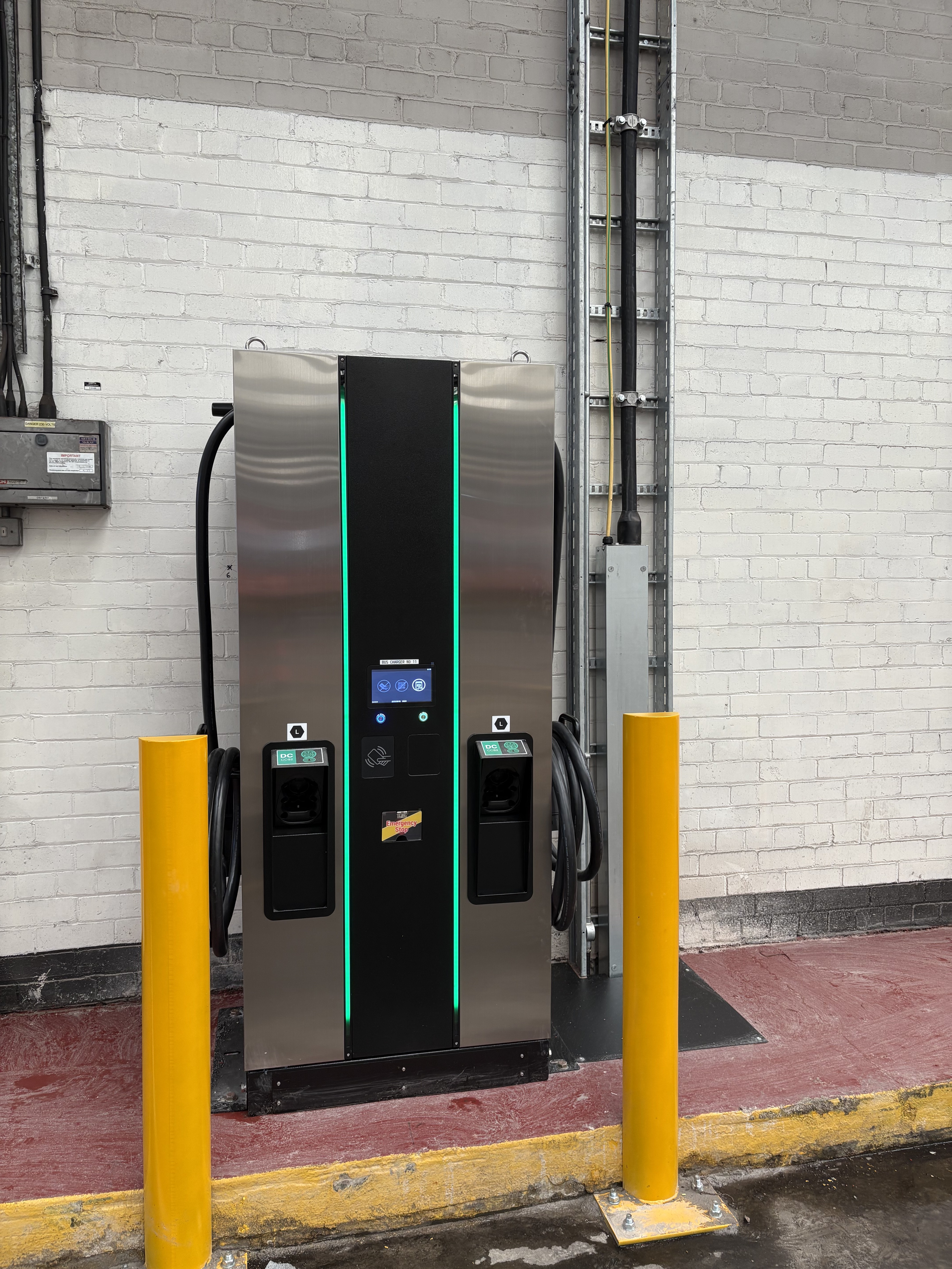 200kW dual-outlet DC fast charger installed in the depot with bollard protection
