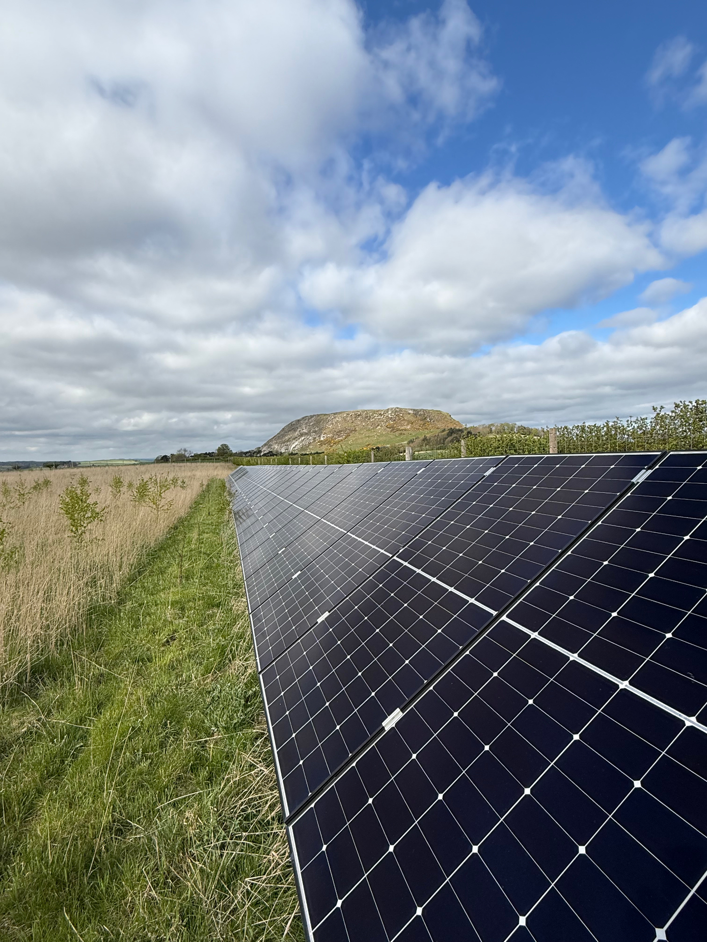 Ground-mount array, commercial site — Eastern Electric install in Fife